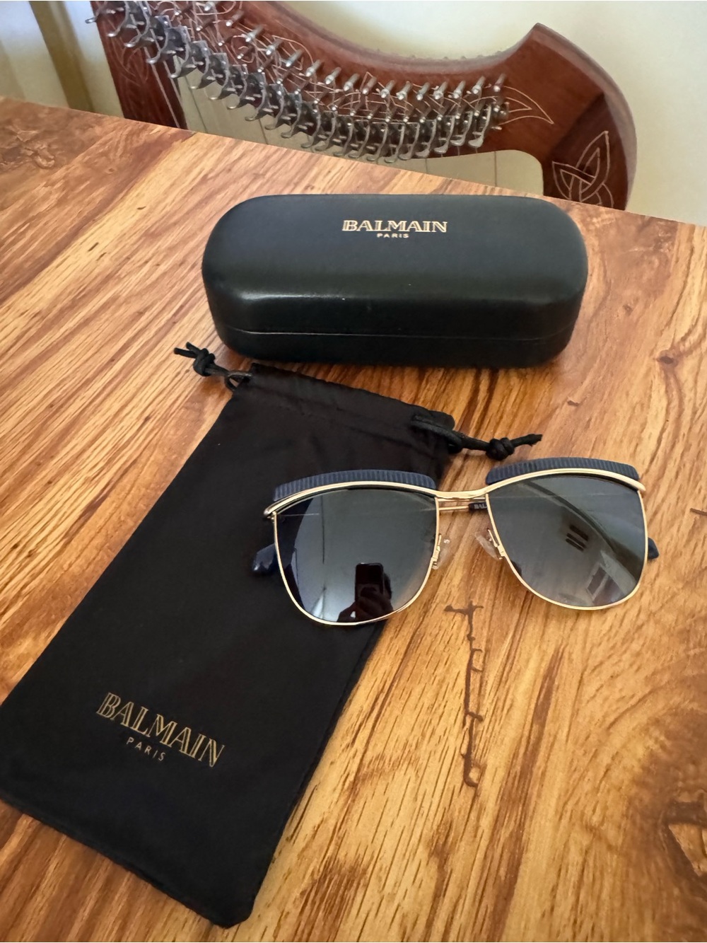Balmain Gold and Black Sunglasses with Dark Blue-Gray Lenses
